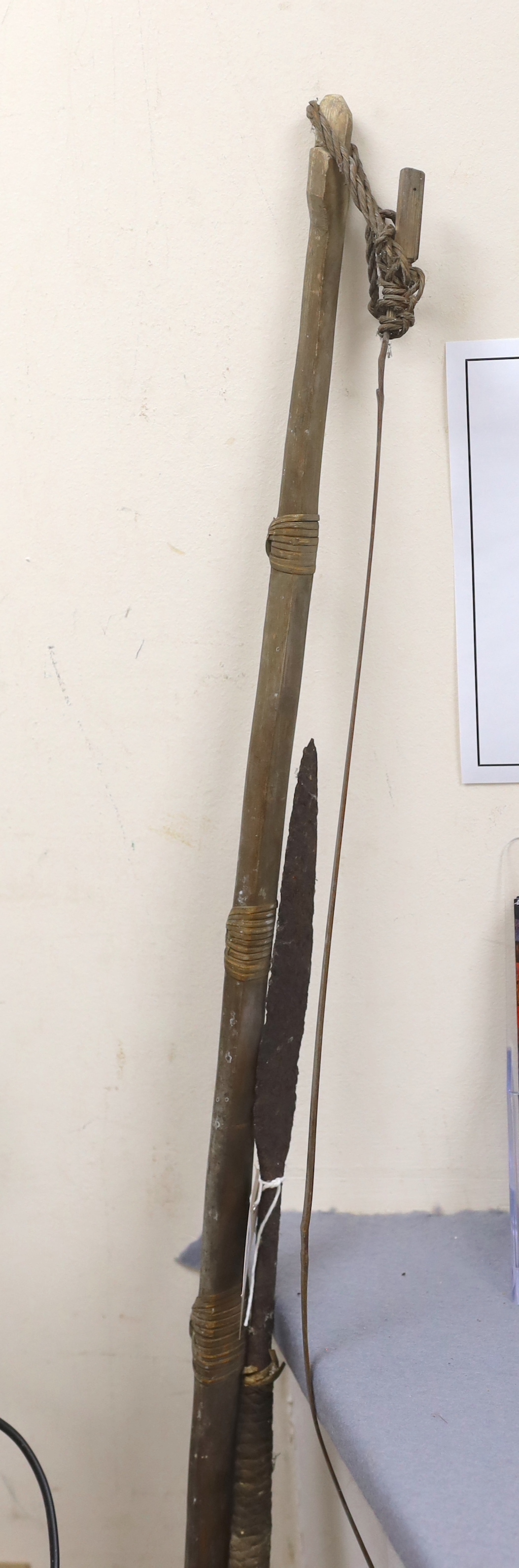 A Zulu type bow and throwing spear, bow 166cm long